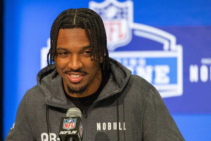 Mar 1, 2024; Indianapolis, IN, USA; Louisiana State quarterback Jayden Daniels (QB01) talks to the media during the 2024 NFL Combine at Lucas Oil Stadium.